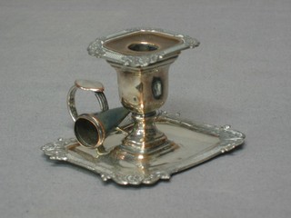 A 19th Century miniature silver plated chamber stick and a snuffer