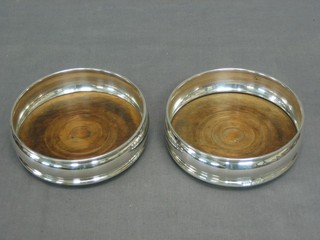 A pair of circular silver bottle coasters, London 1968 4 1/2"