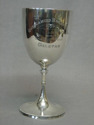 An Indian silver goblet shaped trophy cup, the base marked silver P Orr & Sons Madras, 14 ozs
