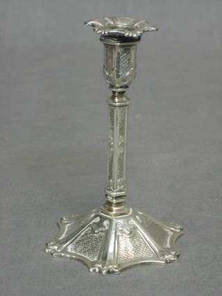 A Victorian embossed silver taper stick with detachable sconces, Sheffield 1847, 5"