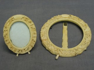 An oval carved ivory easel photograph frame 4" and 1 other 2"