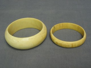 2 heavy ivory bangles