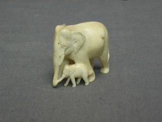 A carved ivory figure of a fisherman 5"