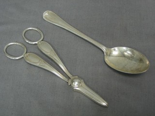 A pair of silver grape scissors, Birmingham 1936 by James Dixon together with a silver spoon, 3 ozs