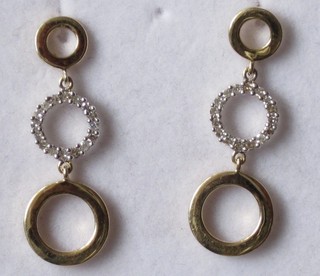 A pair of 9ct gold drop hoop earrings set diamonds