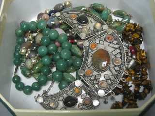 A box of various hardstone necklaces etc