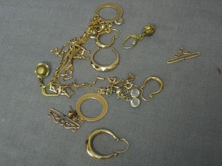 2 pairs of gold hoop earrings and a fine gold chain etc