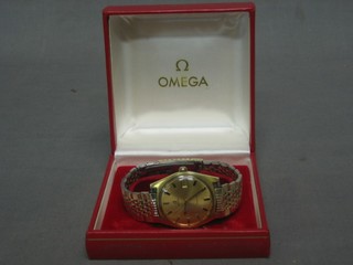 A gentleman's Omega wristwatch contained in a gold plated case