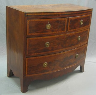 A 19th Century mahogany bow front chest with crossbanded top and fitted 2 short and 3 long drawers, raised on splayed bracket feet 39"