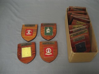 A collection of stay bright badges mounted as plaques