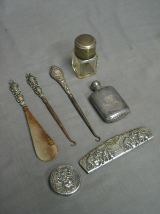 A small silver perfume flask, a Continental silver comb case, 2 silver handled button hooks, a glass jar with silver collar and a silver handled shoe horn etc