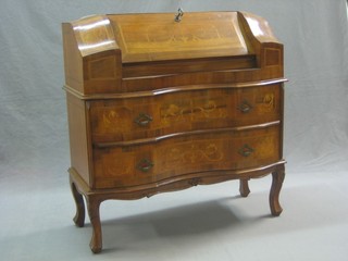 A 19th/20th Century inlaid Kingwood bonheur du jour, the fall front revealing a well fitted interior above 2 long drawers, raised on cabriole supports 32" (some old worm)
