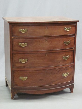 A 19th Century mahogany bow front chest of 4 long drawers with brass swan neck drop handles, raised on bracket feet 26"