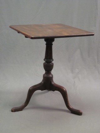 A 19th Century square mahogany wine table, raised on a pillar and tripod column 21"