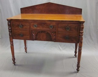 A William IV mahogany sideboard with raised back fitted 2 short drawers, flanked by 4 short drawers, raised on turned supports 49"