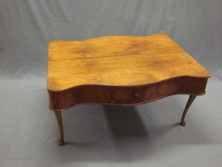 A shaped mahogany occasional table formed from a 2 tier what-not, fitted 2 drawers and raised on cabriole supports 31"