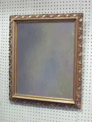 A rectangular 19th Century plate mirror contained in a pierced gilt frame 21"