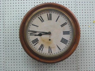 An Ansonia American wall clock the 12" paper dial with Roman numerals contained in an oak case