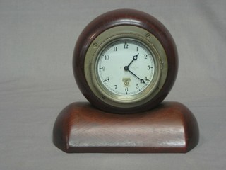 A Smiths 8 day car clock with silvered dial and Arabic numerals, the dial marked 176.718 contained in a wooden case