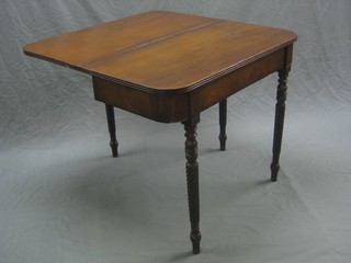 A 19th Century D shaped tea table, raised on spiral turned supports 35"