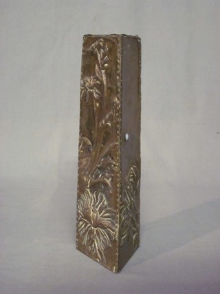 An Art Nouveau style embossed brass triangular shaped vase with floral decoration 12"