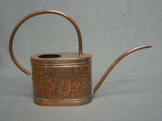 An oval embossed copper watering can 9"