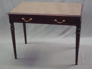 A pair of Continental mahogany writing tables, fitted 2 drawers raised on turned supports 39"