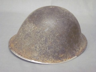 A 1950's steel helmet (no liner)