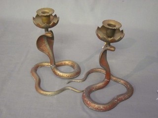 A pair of Benares brass candlesticks 9"