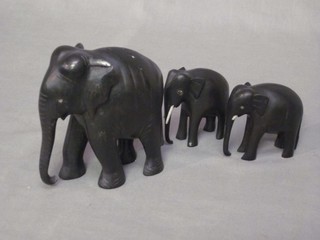 An ebony figure of a walking elephant 5" and 2 others