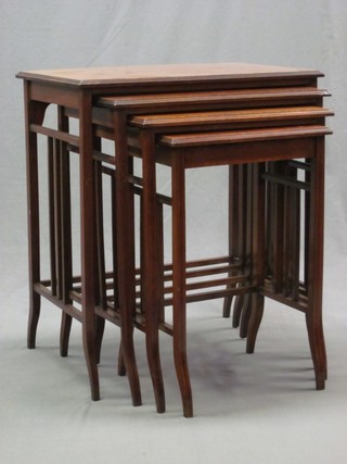 A rectangular quartetto of Edwardian inlaid mahogany tables with crossbanded tops 24"