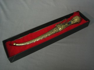 An Eastern gilt metal dagger with 7 1/2" blade