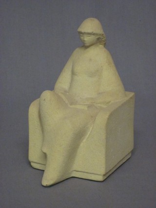 A carved stone sculpture in the form of a lady reading a book, the base marked Marbell by Stone Art Belgium 6"