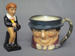 A Royal Doulton Dickensian figure of David Copperfield 4 1/2" and a Royal Doulton character jug of Toby Weller 