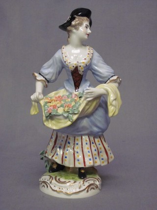 A 20th Century Continental porcelain figure of an 18th Century standing lady, 8", the base with crown N mark