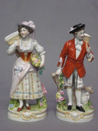 A pair of 20th Century Continental porcelain figures of 18th Century figures with Panniers, the bases impressed 11743 6"