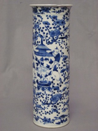An Oriental blue and white cylindrical vase decorated figures by an urn, the base with 4 character mark (chip to rim and cracked) 10"