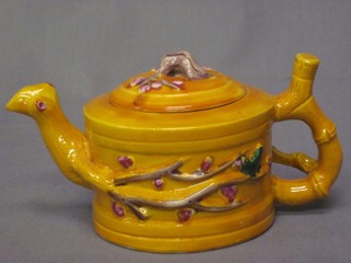 A Ch'ing Dynasty? cylindrical teapot, yellow ground and floral decorated, the base with 6 character mark 3"