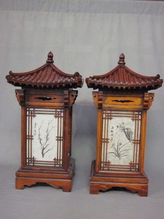 A pair of Chinese square rectangular lanterns in the form of miniature Pagodas 10", raised on bracket feet