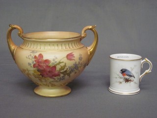 A Royal Worcester blush ivory twin handled vase with floral decoration, the base with purple Worcester mark and 8 dots RD 286549 4" (f and r to rim) together with a Worcester mug decorated a bird, the base with green mark and 11 dots