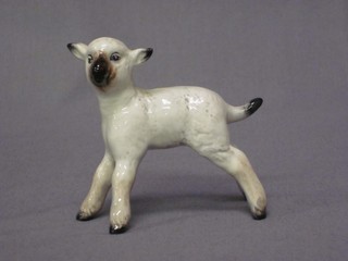 A Beswick figure of a standing lamb 3"