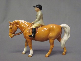 A Beswick figure of a child mounted on a Palomino Pony 4"