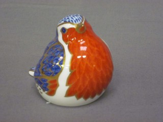 A Royal Crown Derby porcelain figure of a seated bird, the base marked LV1 3"