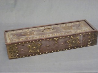 A rectangular Eastern box with studded sliding lid and fitted interior 23"