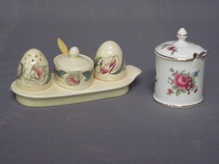 A Susie Cooper 3 piece condiment set on tray together with a Royal Crown Staffordshire preserve jar
