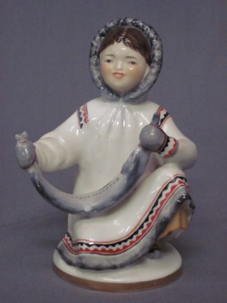 A Soviet Russian porcelain figure of a girl with fish 6"