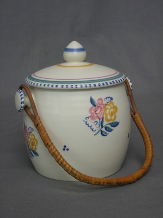 A Poole Pottery cylindrical biscuit barrel, the base with dolphin mark and impressed 230 5"