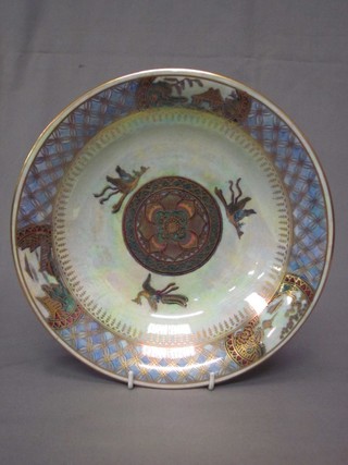A Wedgwood circular lustre ware bowl decorated mythical birds, the reverse marked Z4830F and with Portland vase mark 9"