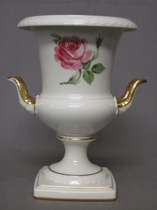 A Bavarian porcelain twin handled vase with rose decoration 10"