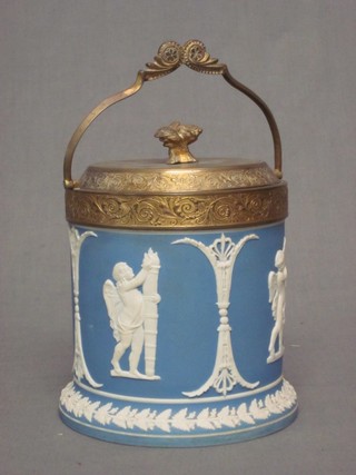 A blue Jasperware biscuit barrel and cover with gilt metal mounts 5"